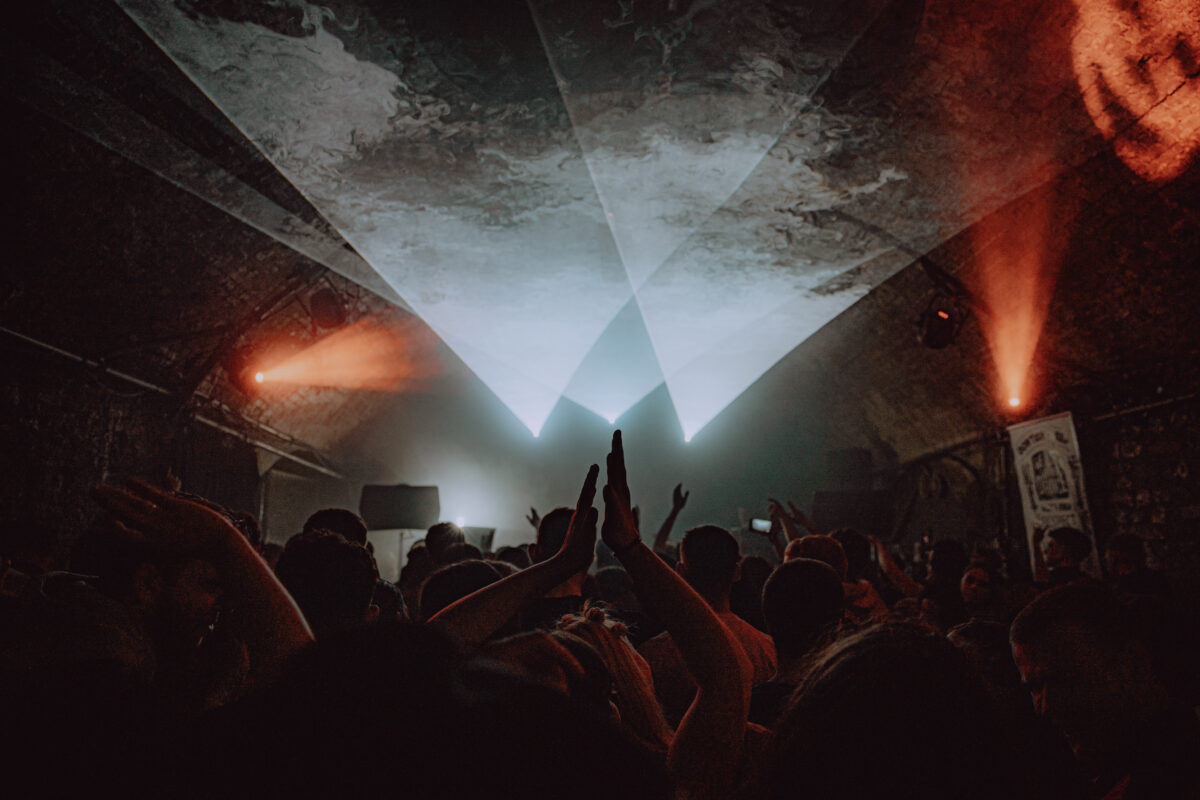 lasers shining over crowd