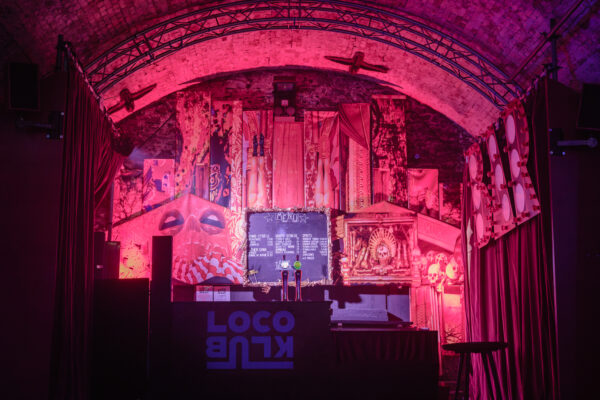 the bar in tunnel 3 lit up with red lighting.